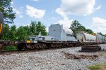 DODX 39915 rides south on M841